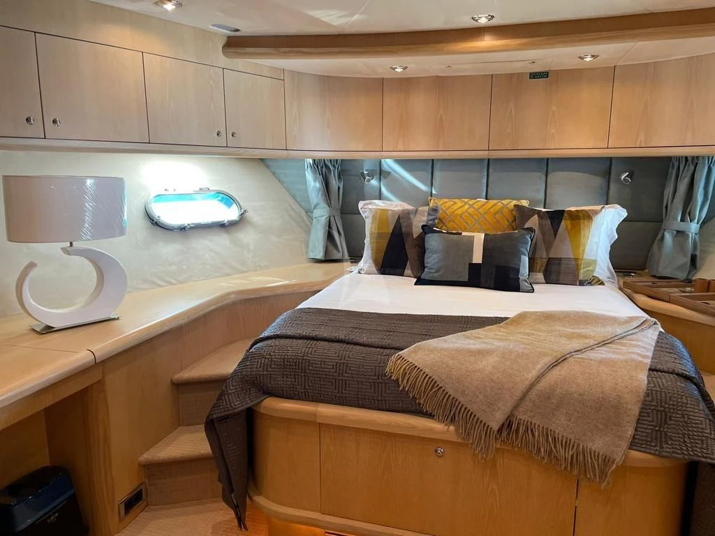 a bed in a room aboard EXCELERATE Z Yacht for Sale