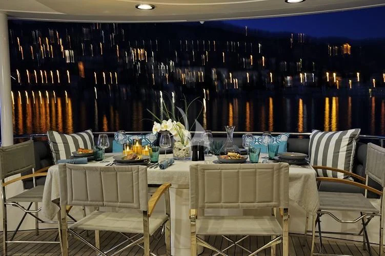 a table set for a dinner aboard EXCELERATE Z Yacht for Sale