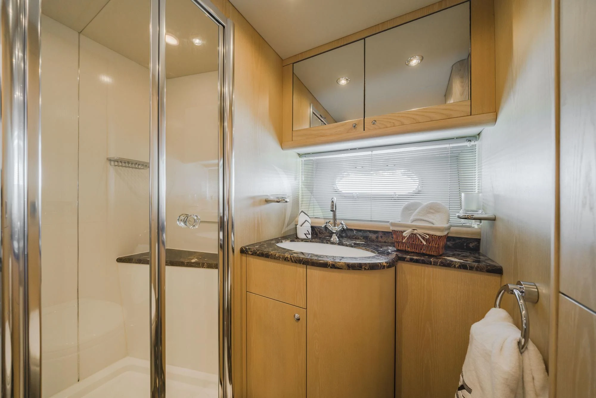 a bathroom with a glass shower aboard EXCELERATE Z Yacht for Sale