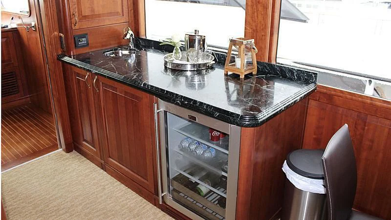a kitchen with a stove and oven aboard DRIVEN Yacht for Sale
