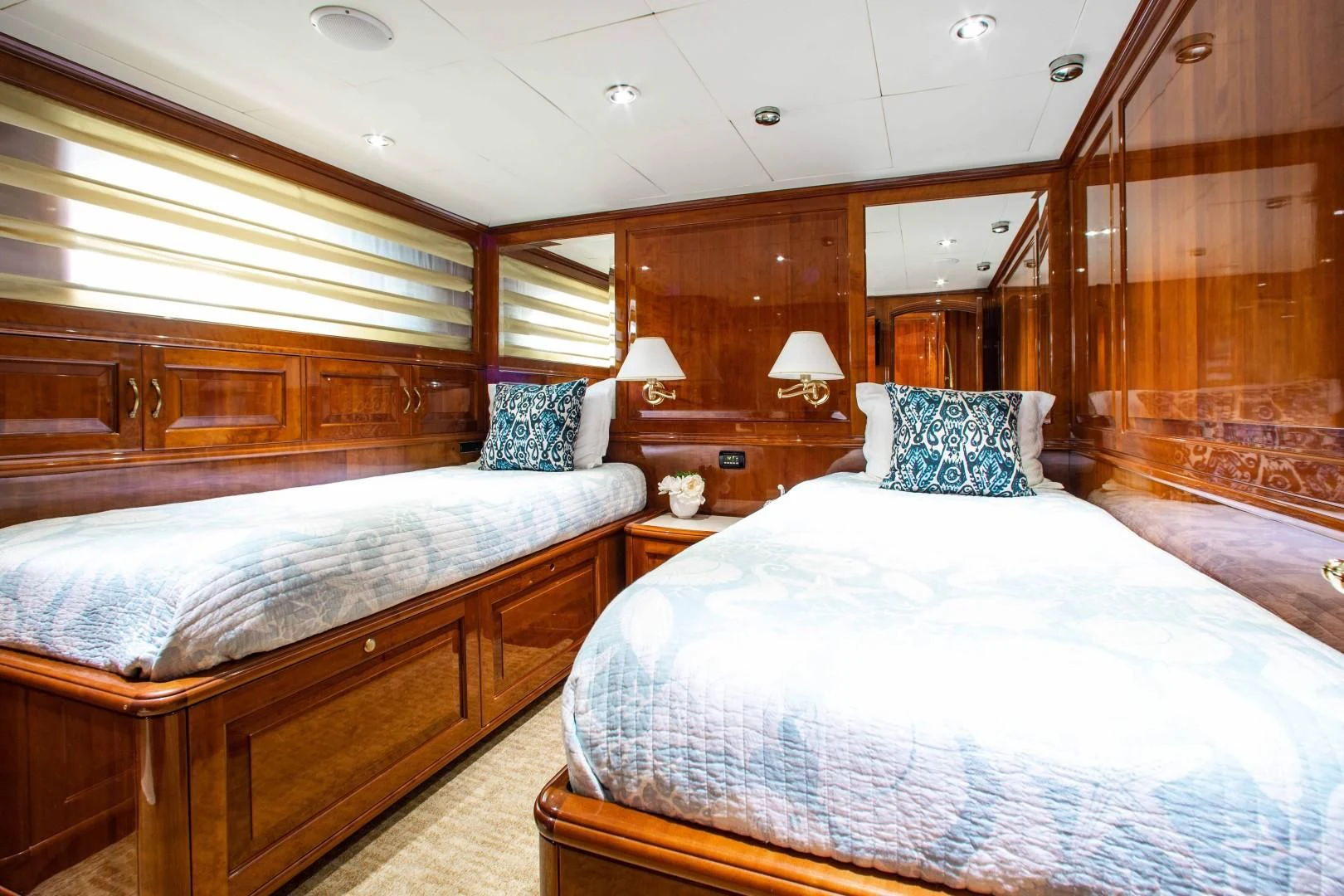 a couple of beds in a room aboard DRIVEN Yacht for Sale