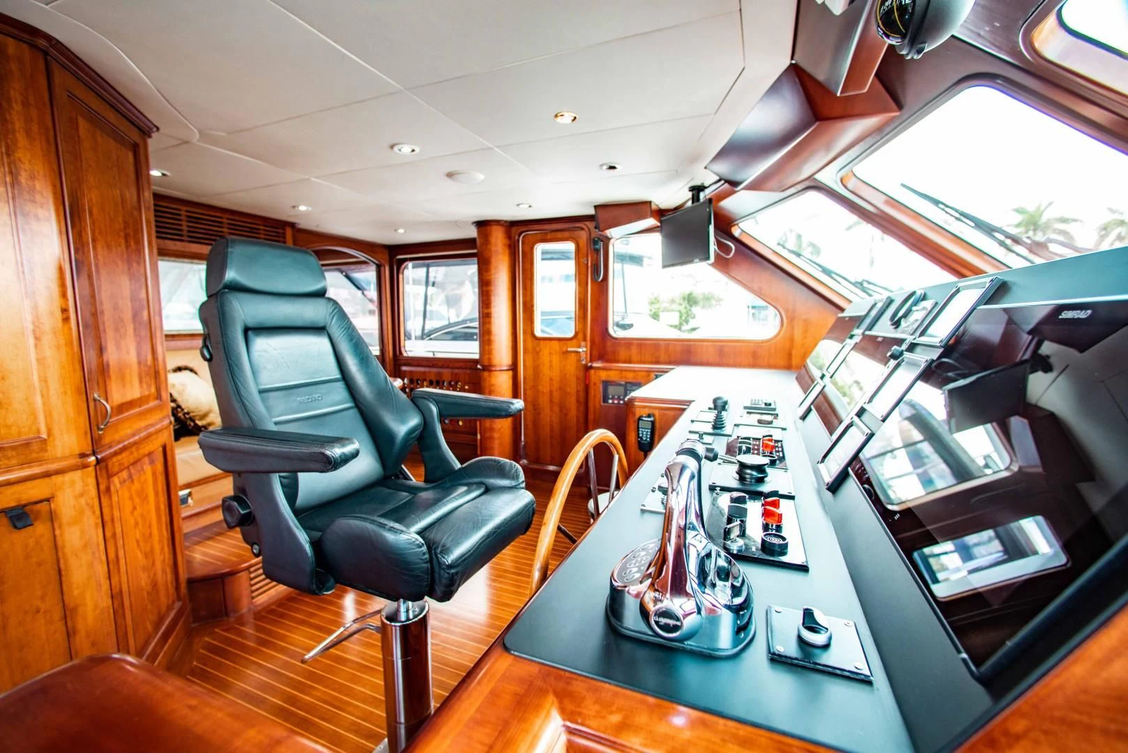 a vehicle with a table and chairs aboard DRIVEN Yacht for Sale