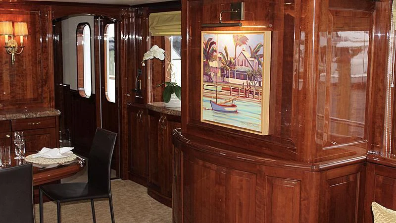 a room with a painting on the wall aboard DRIVEN Yacht for Sale