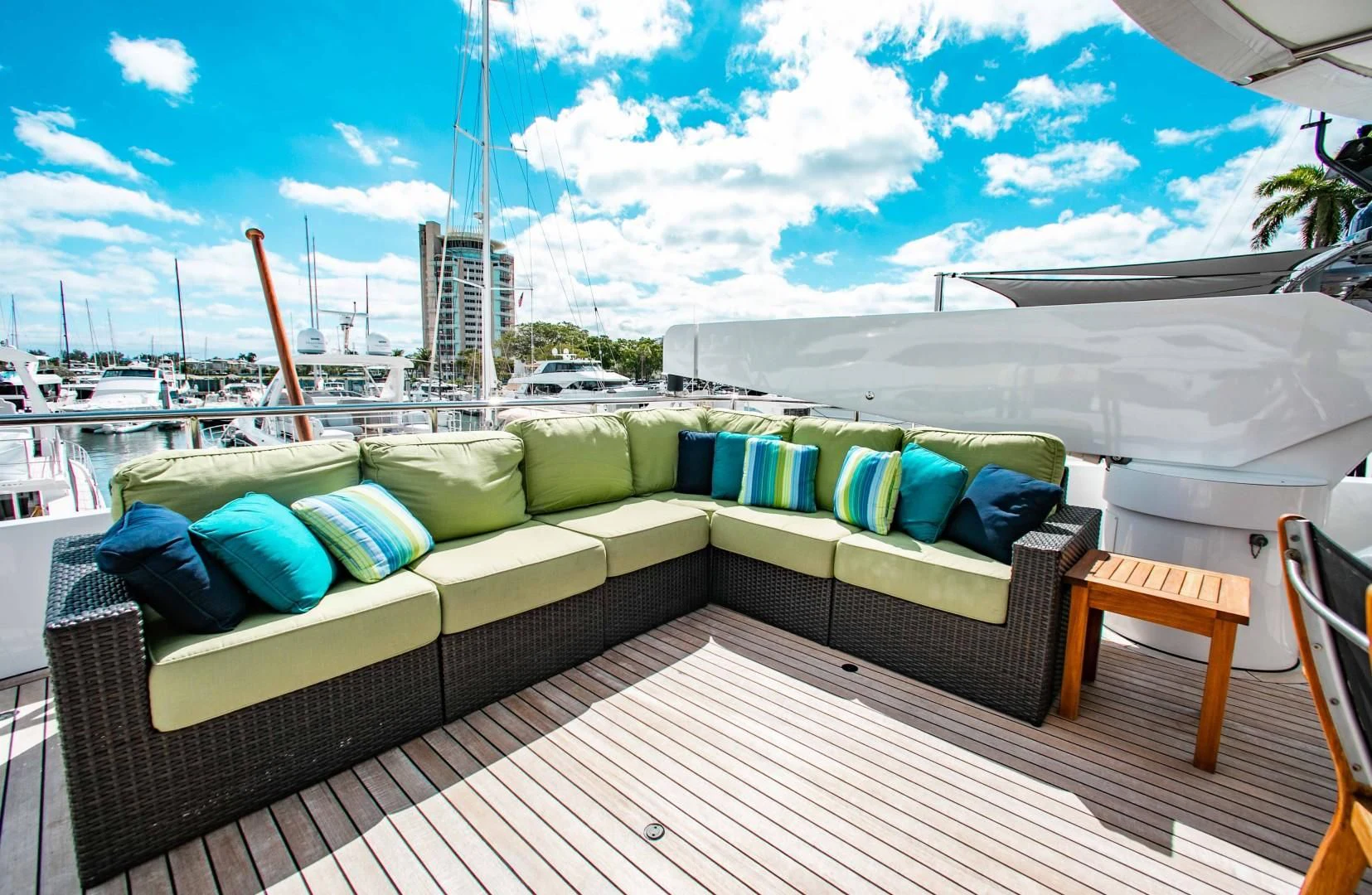 a couch on a deck aboard DRIVEN Yacht for Sale
