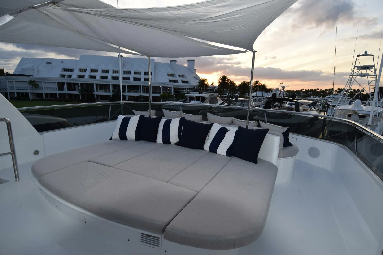 a large white boat on a body of water aboard DRIVEN Yacht for Sale