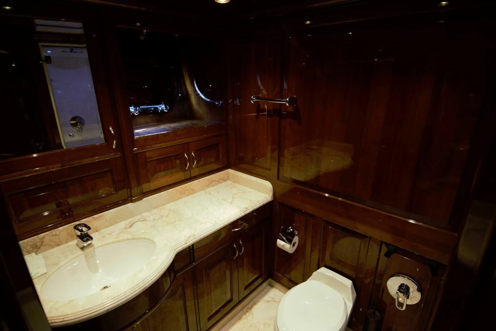 a bathroom with a sink and a toilet aboard DRIVEN Yacht for Sale