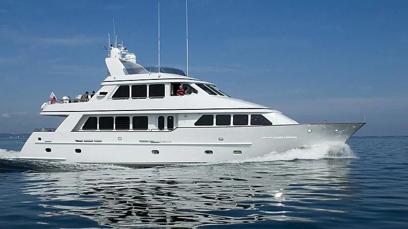 a white yacht on the water aboard DRIVEN Yacht for Sale