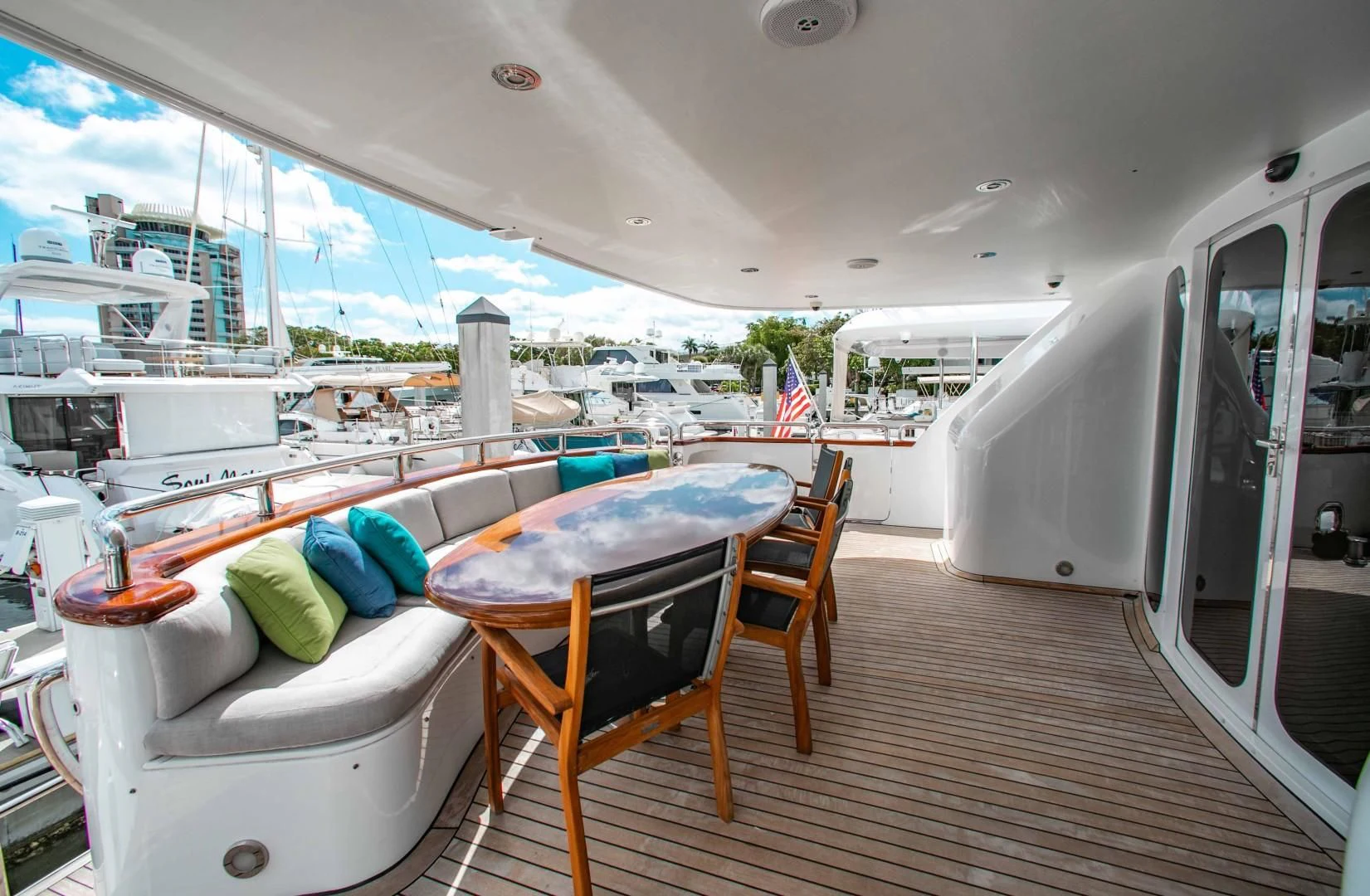 a room with a table and chairs aboard DRIVEN Yacht for Sale