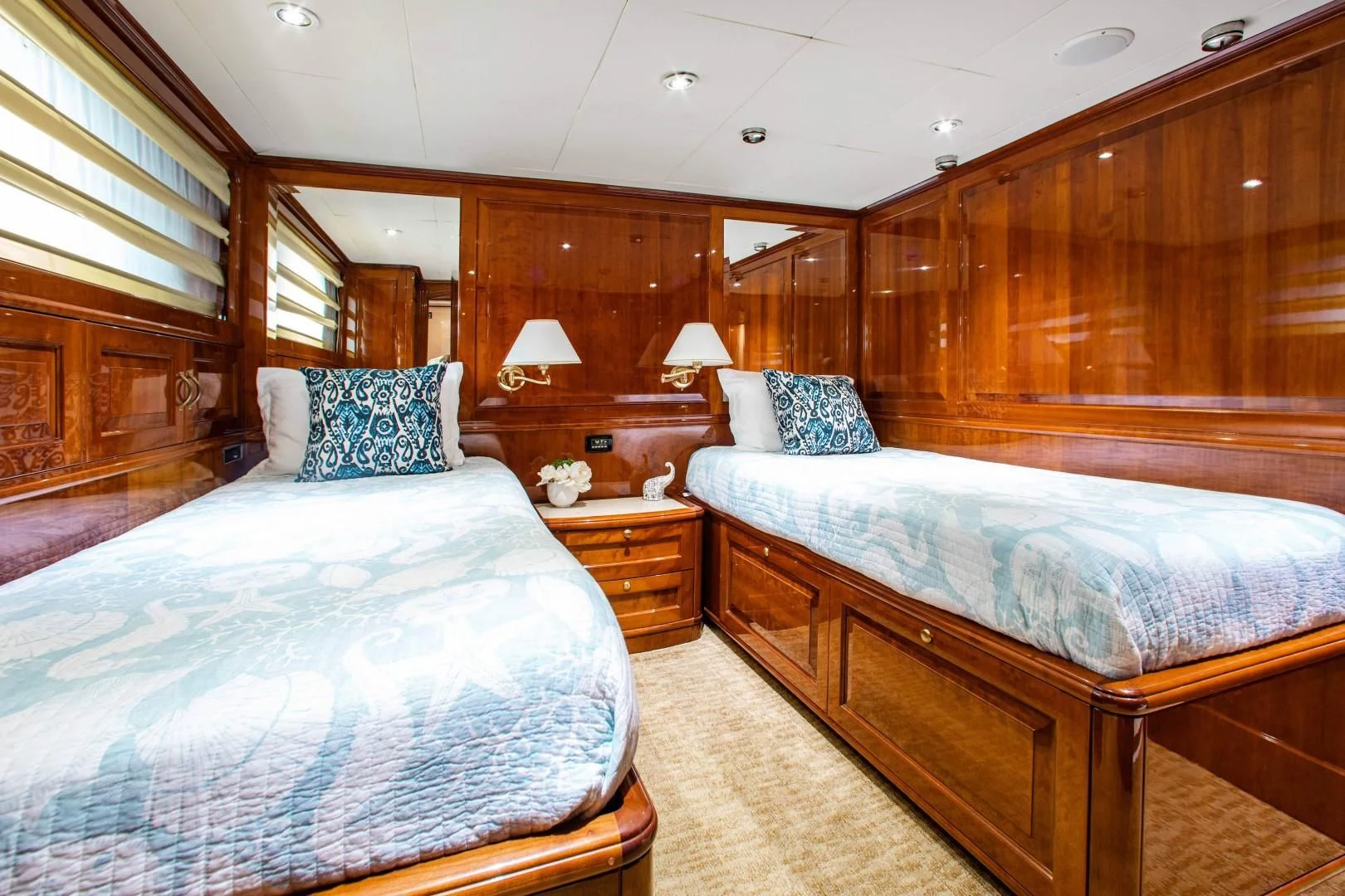 a couple of beds in a room aboard DRIVEN Yacht for Sale