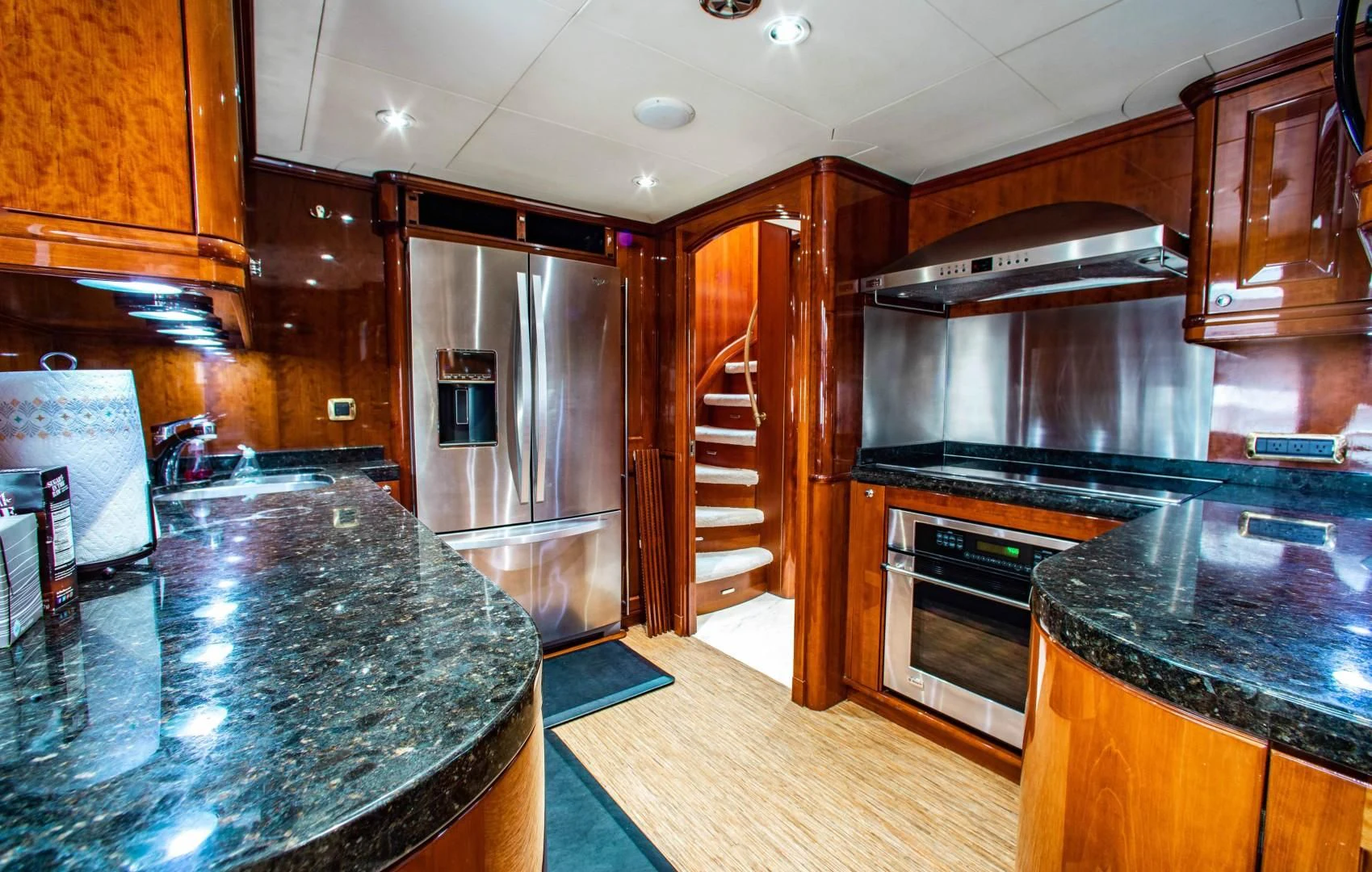 a kitchen with a stainless steel stove aboard DRIVEN Yacht for Sale