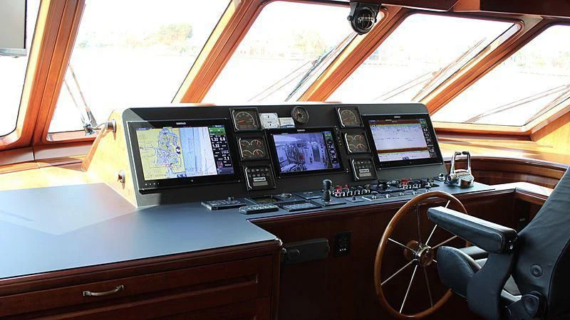a vehicle with computers and monitors aboard DRIVEN Yacht for Sale