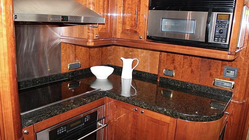 a kitchen with a large oven aboard DRIVEN Yacht for Sale