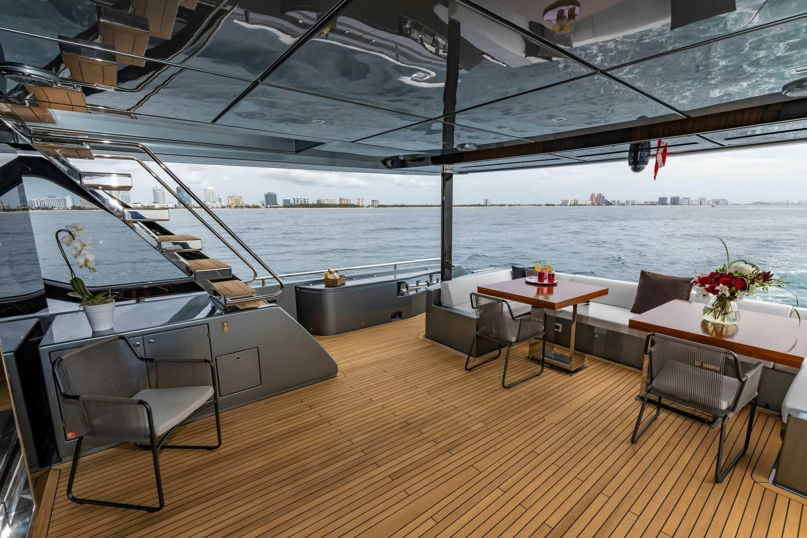 a room with a table and chairs aboard NO SURRENDER Yacht for Sale
