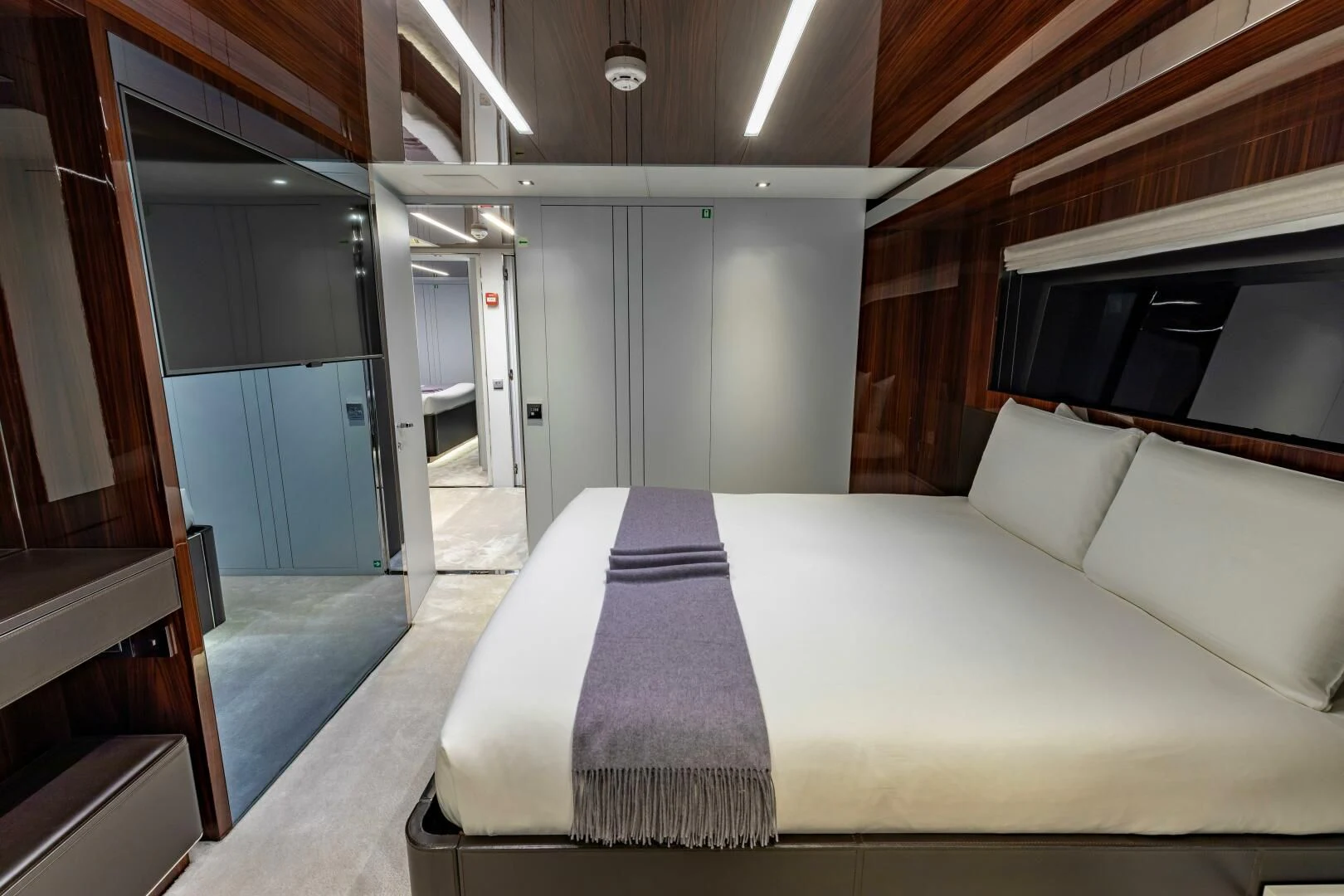 a bed in a room aboard NO SURRENDER Yacht for Sale