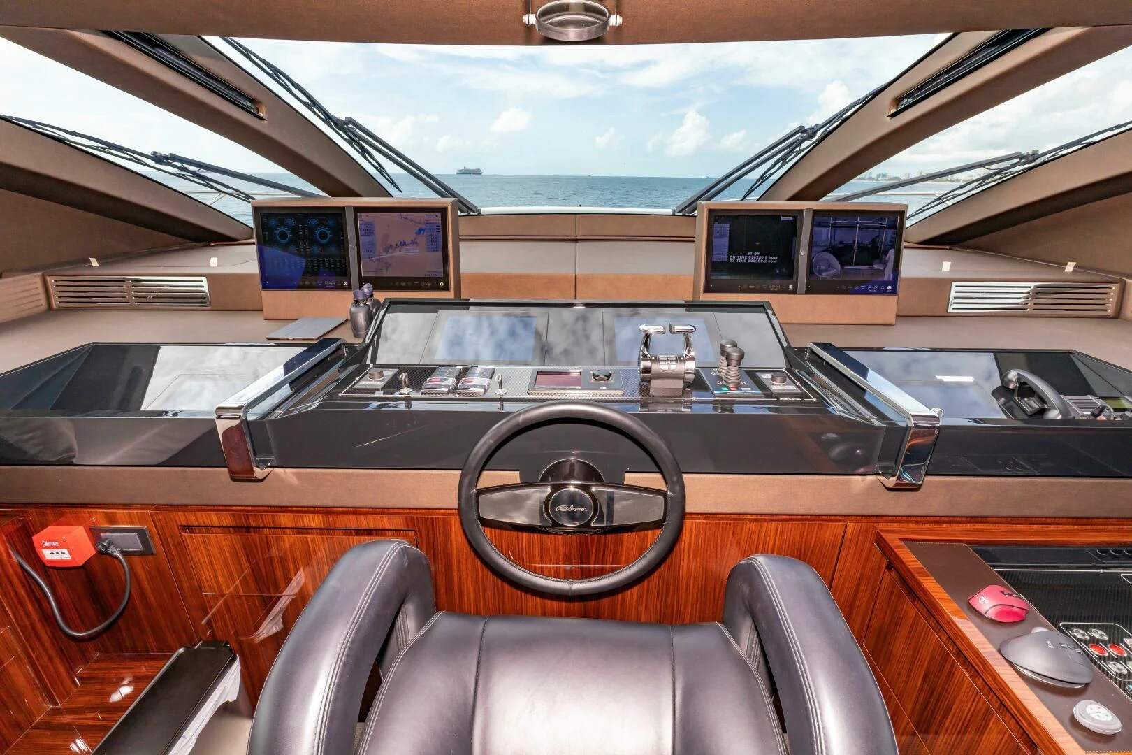 inside of a car aboard NO SURRENDER Yacht for Sale