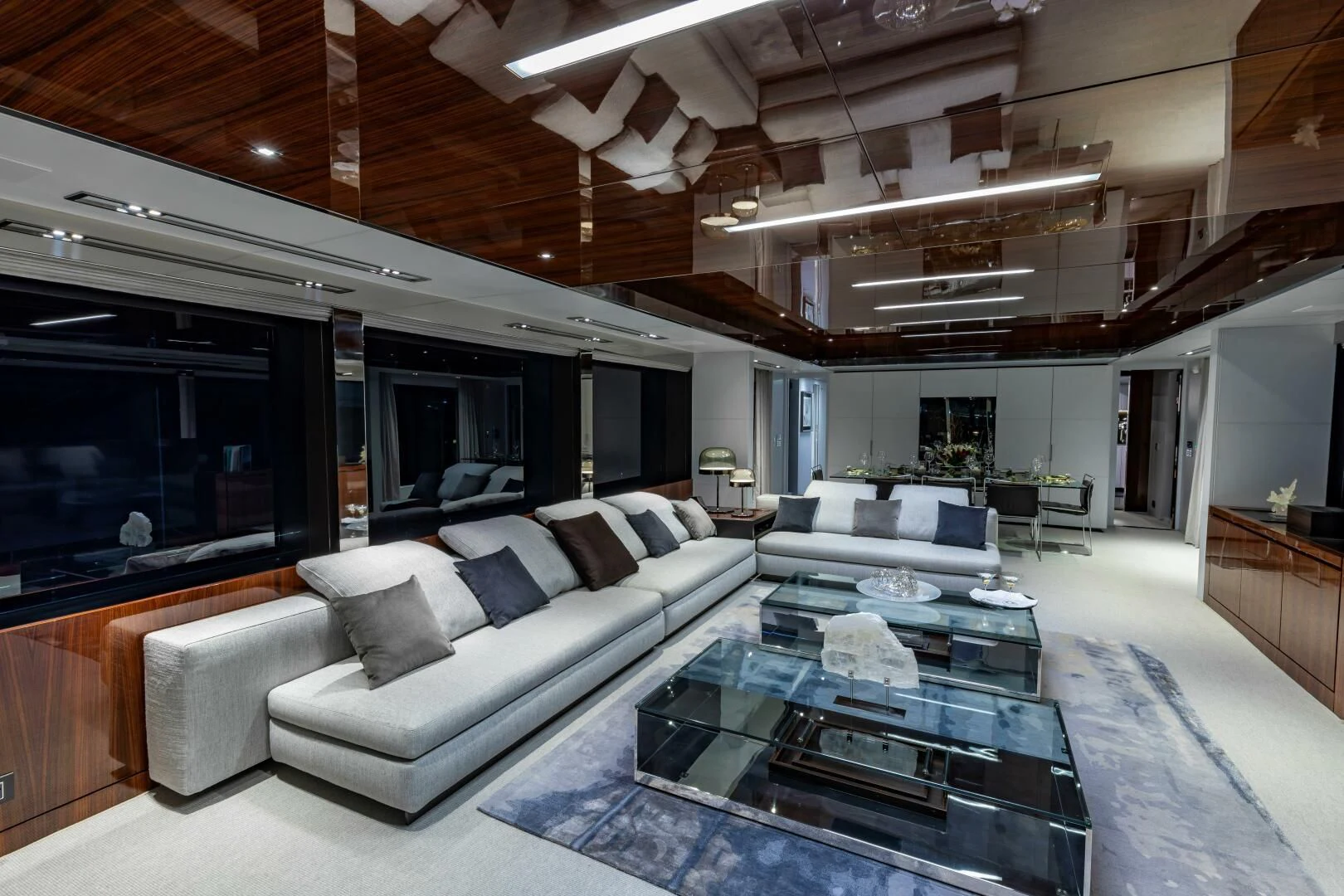 a large living room with a large open ceiling aboard NO SURRENDER Yacht for Sale