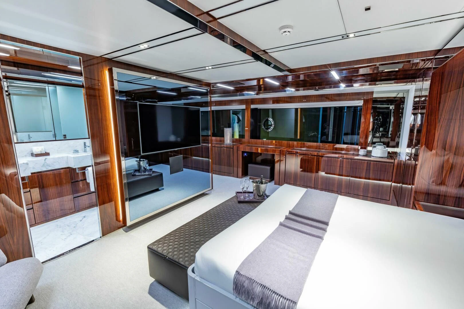 a large room with a large mirror aboard NO SURRENDER Yacht for Sale