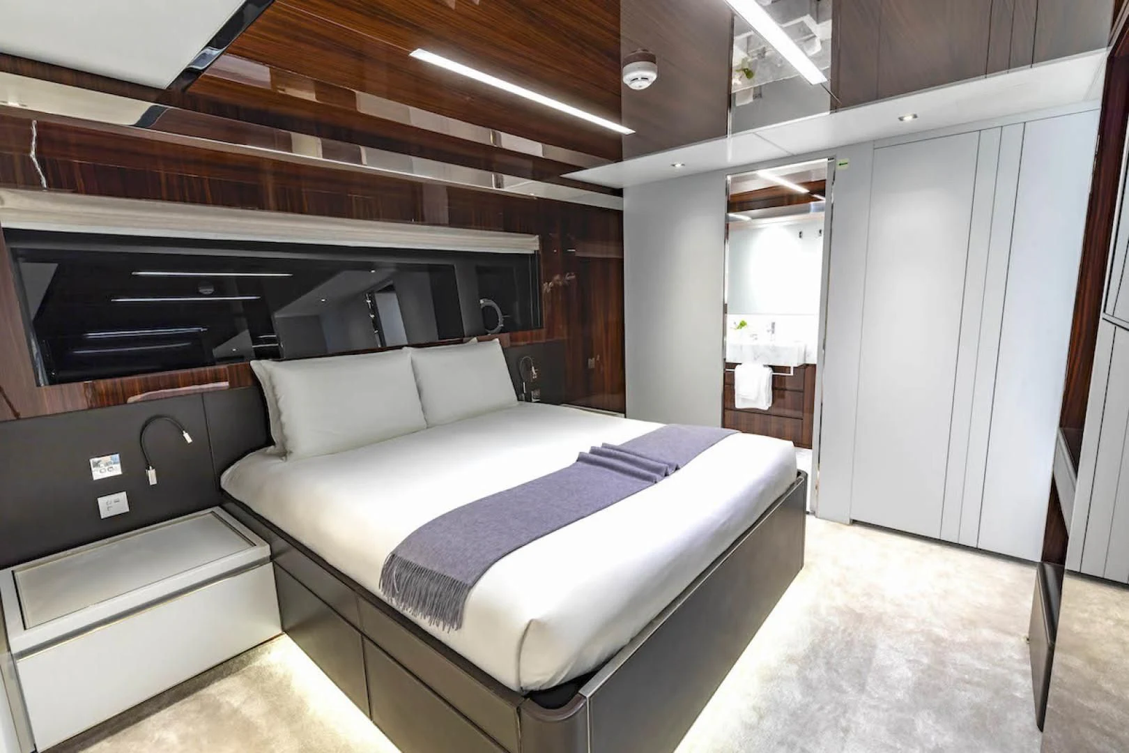 a bed in a room aboard NO SURRENDER Yacht for Sale