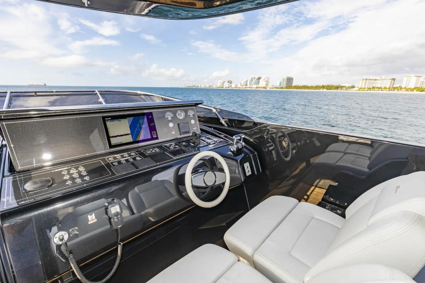 inside of a car aboard NO SURRENDER Yacht for Sale