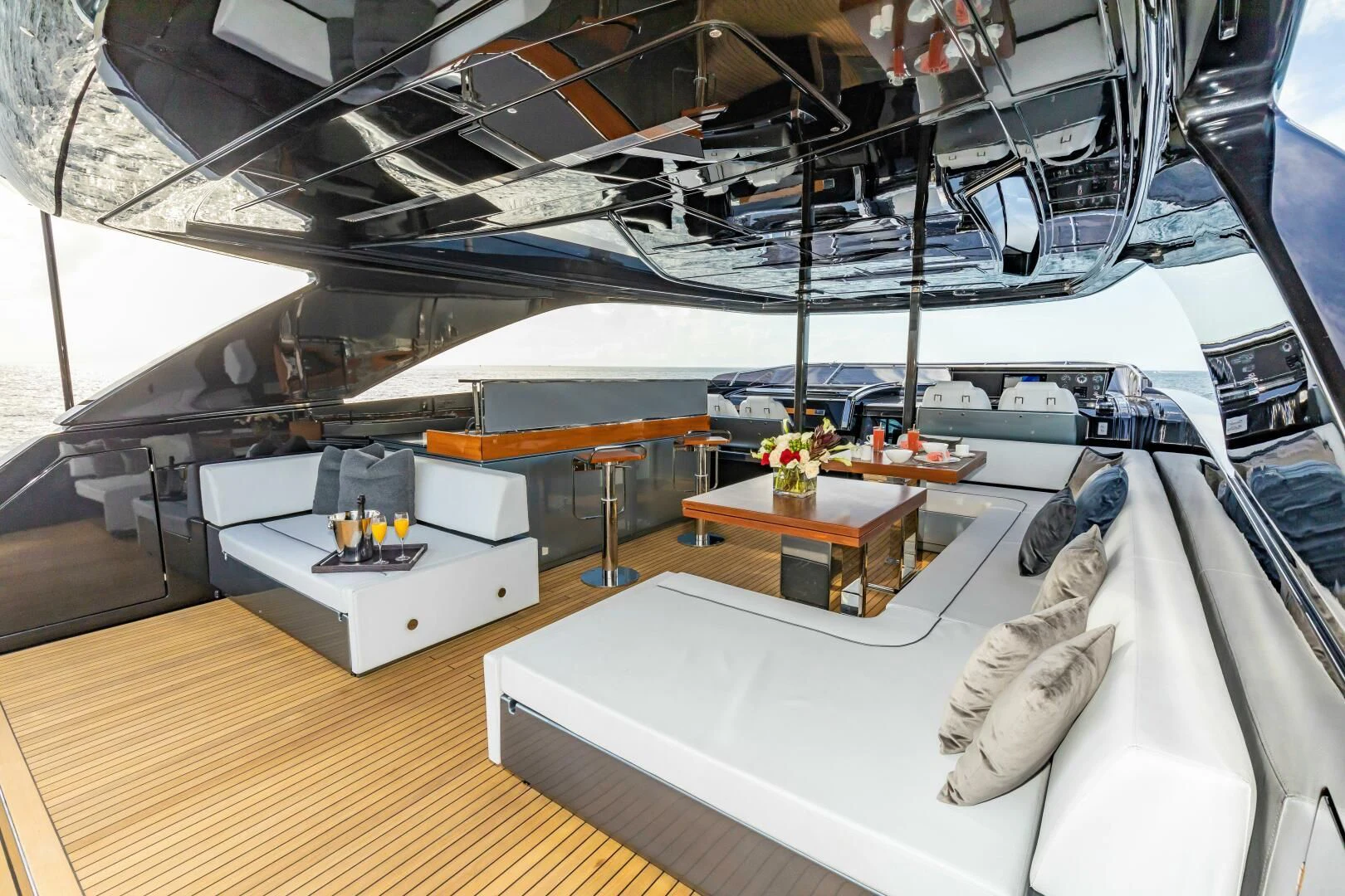 a room with a table and chairs aboard NO SURRENDER Yacht for Sale