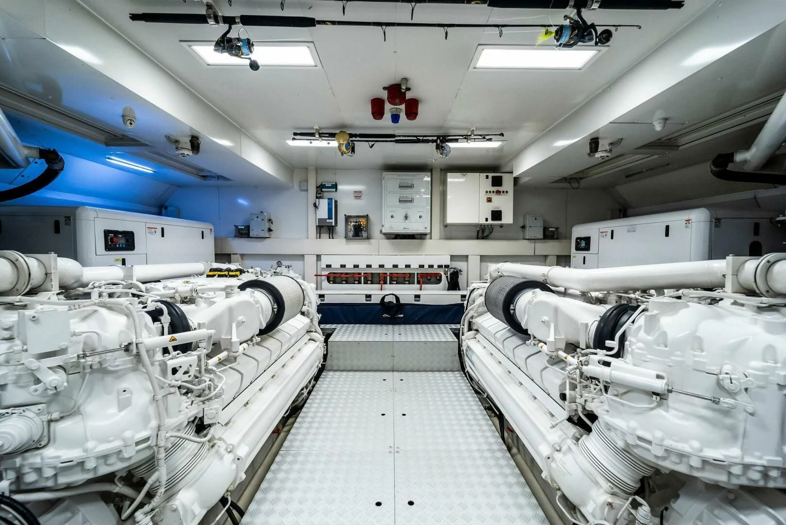a room with several white machines aboard NO SURRENDER Yacht for Sale