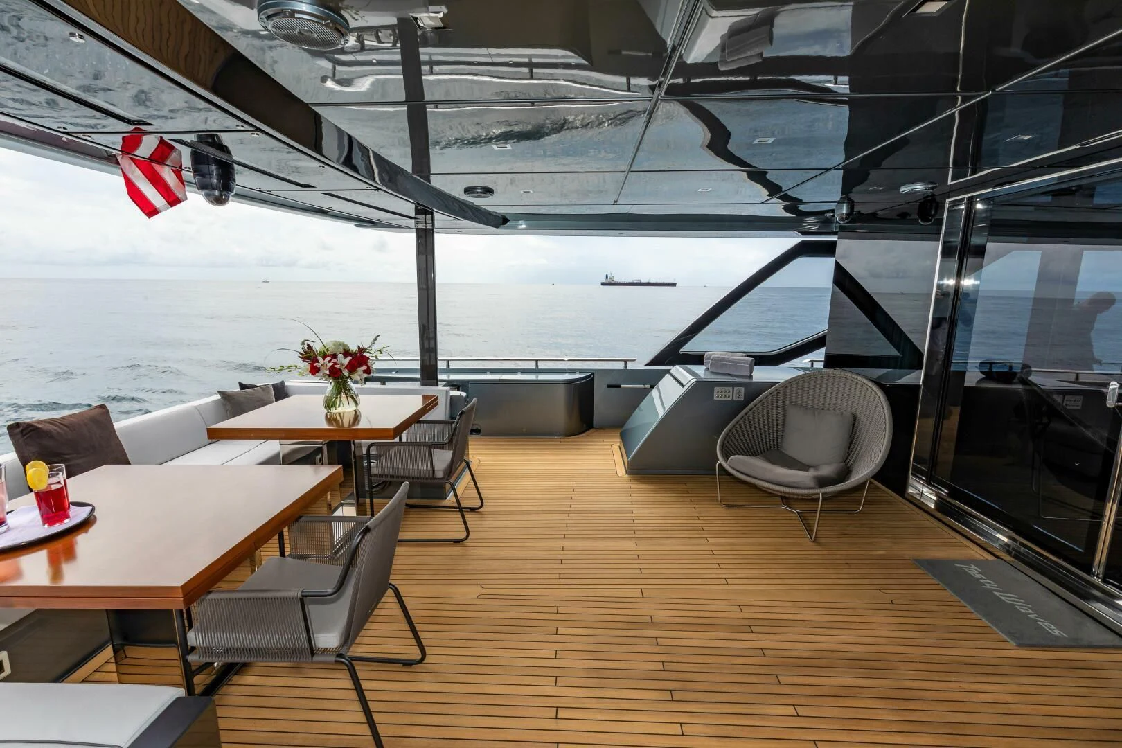 a room with a table and chairs aboard NO SURRENDER Yacht for Sale