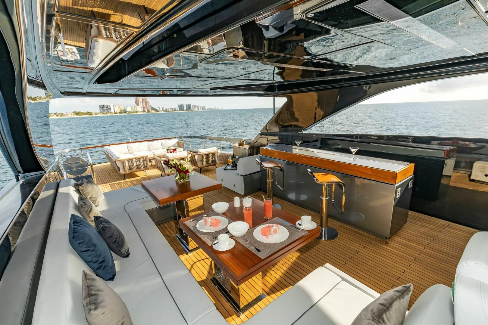 a room with a table and chairs aboard NO SURRENDER Yacht for Sale