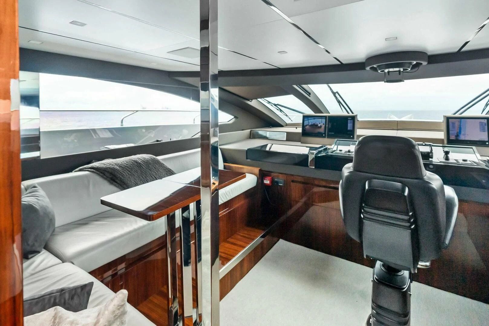 a room with a bed and desk aboard NO SURRENDER Yacht for Sale