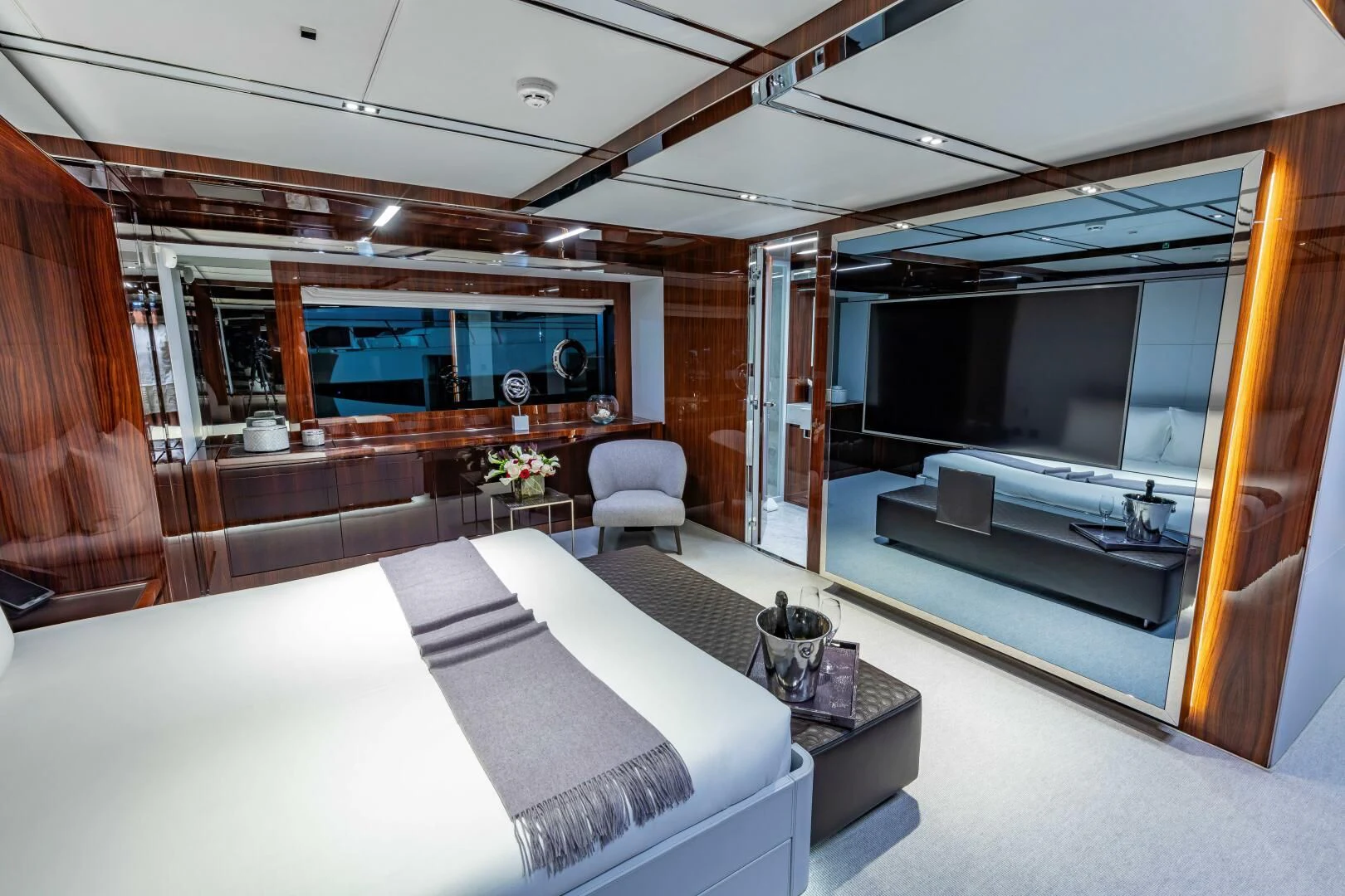 a room with a bed and a couch aboard NO SURRENDER Yacht for Sale