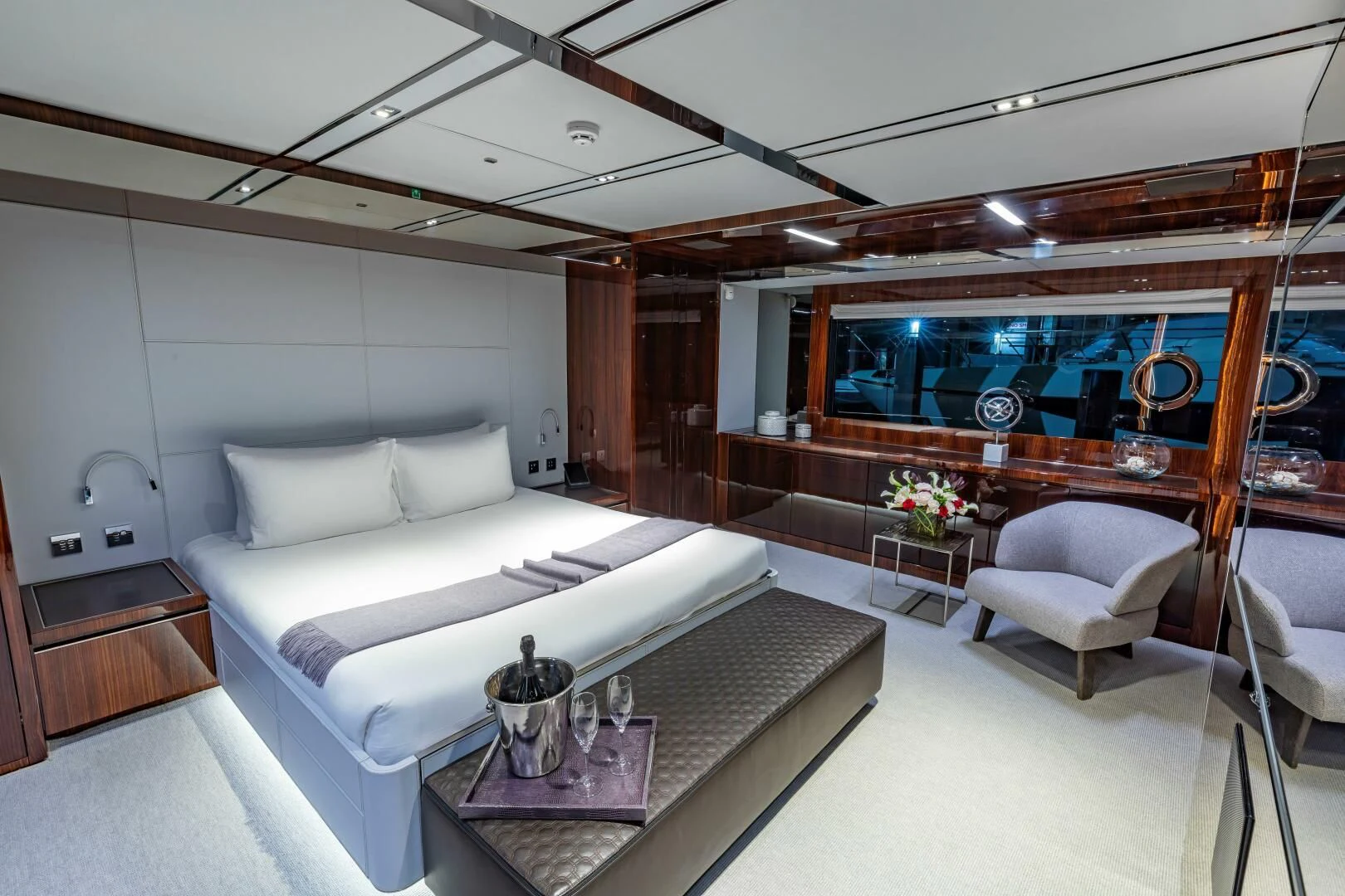 a room with a couch and a table aboard NO SURRENDER Yacht for Sale