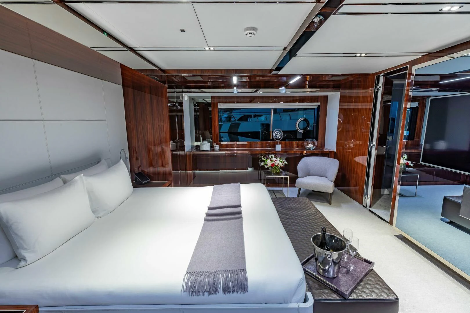 a room with a couch and a table aboard NO SURRENDER Yacht for Sale