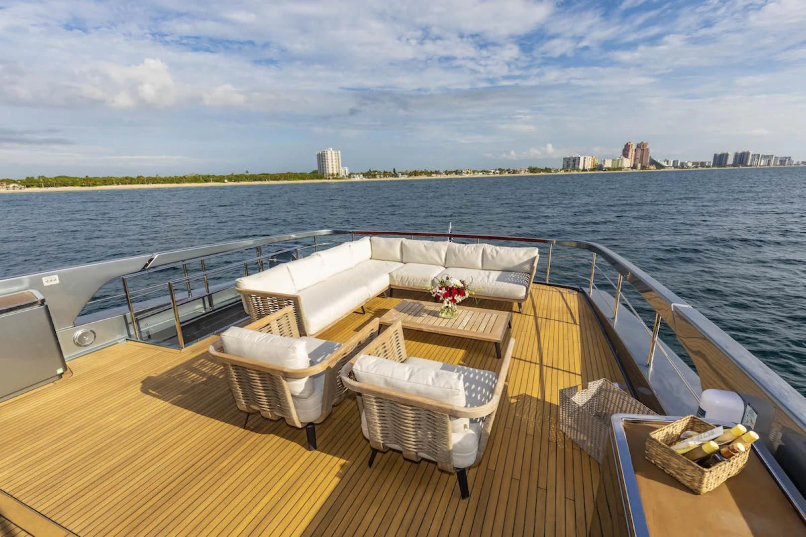 a deck with a view of a city and water aboard NO SURRENDER Yacht for Sale