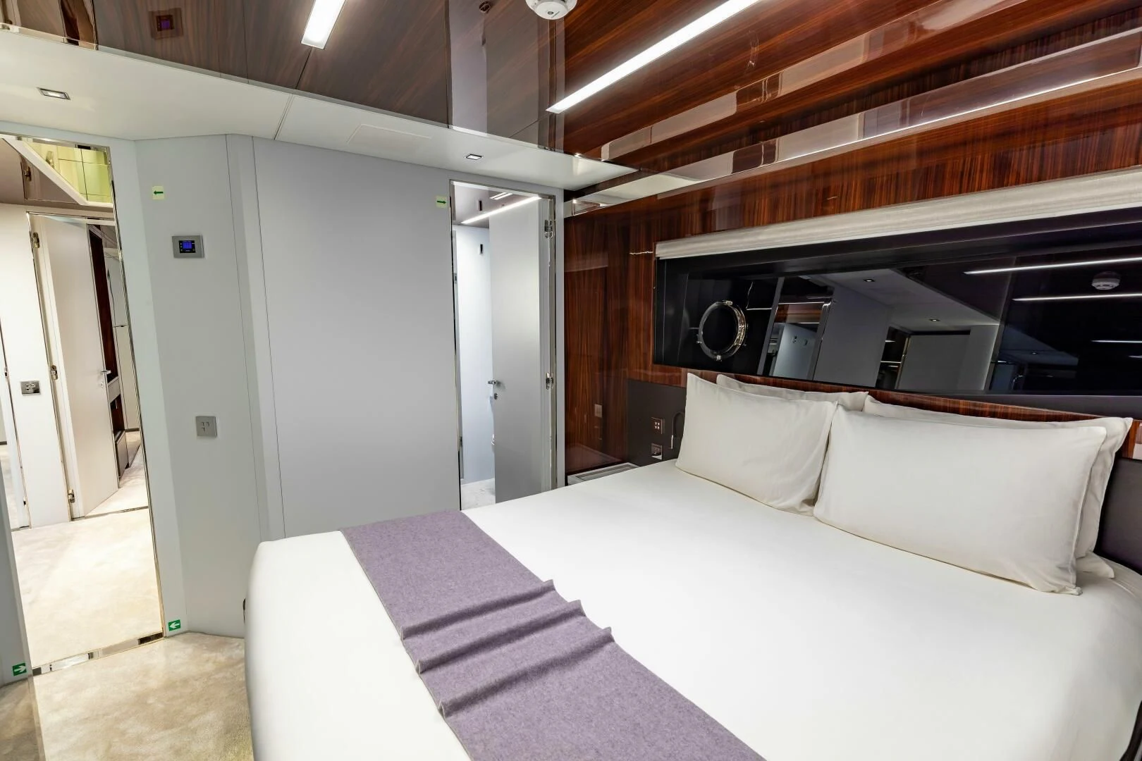 a room with a bed and a large speaker aboard NO SURRENDER Yacht for Sale