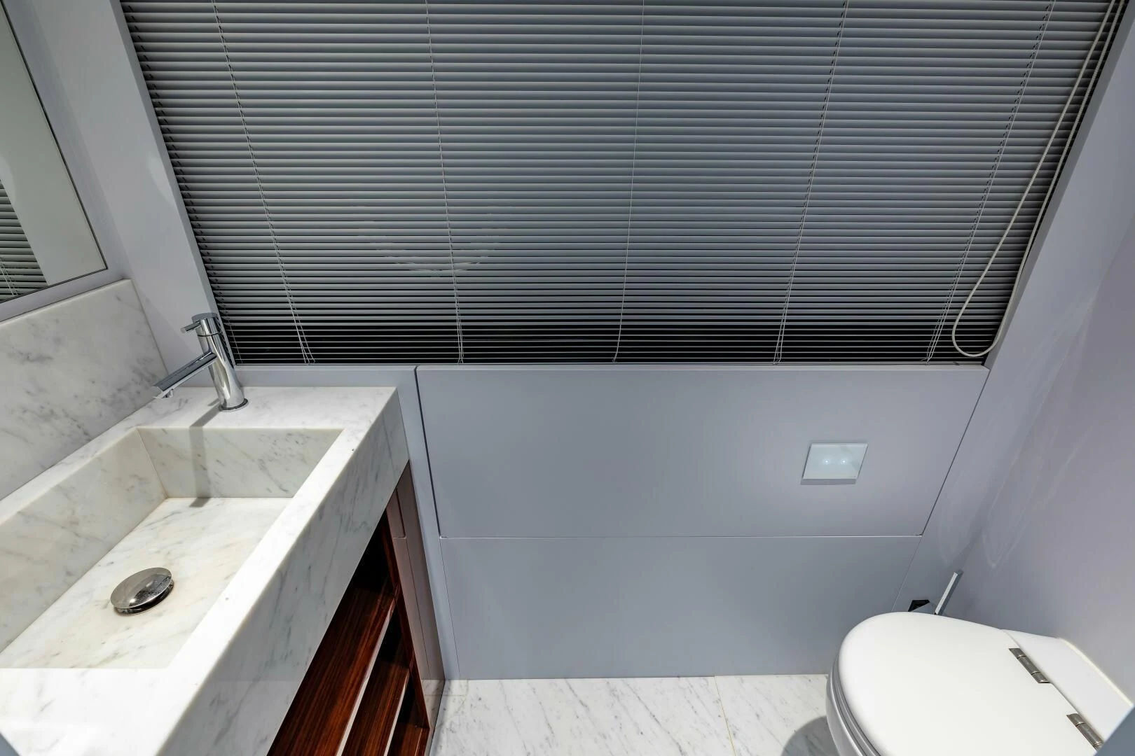 a bathroom with a sink and a toilet aboard NO SURRENDER Yacht for Sale