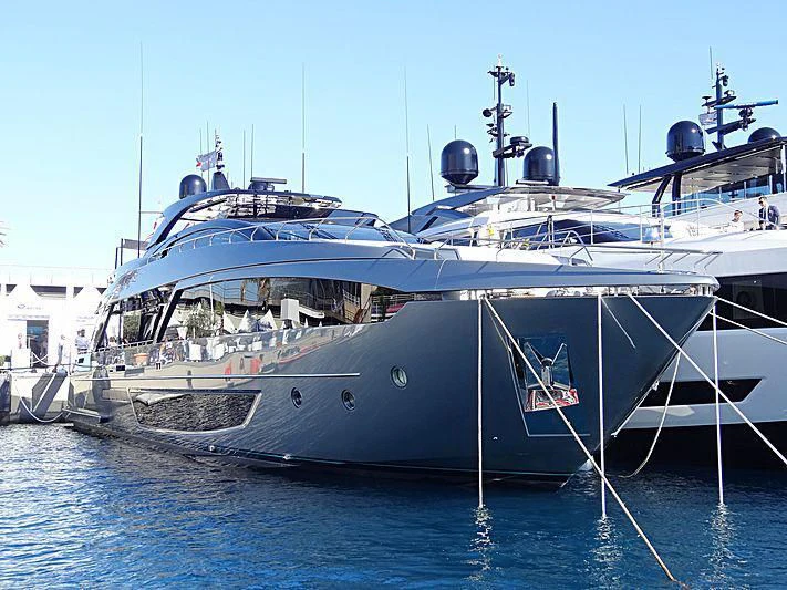 a couple of large boats in the water aboard NO SURRENDER Yacht for Sale
