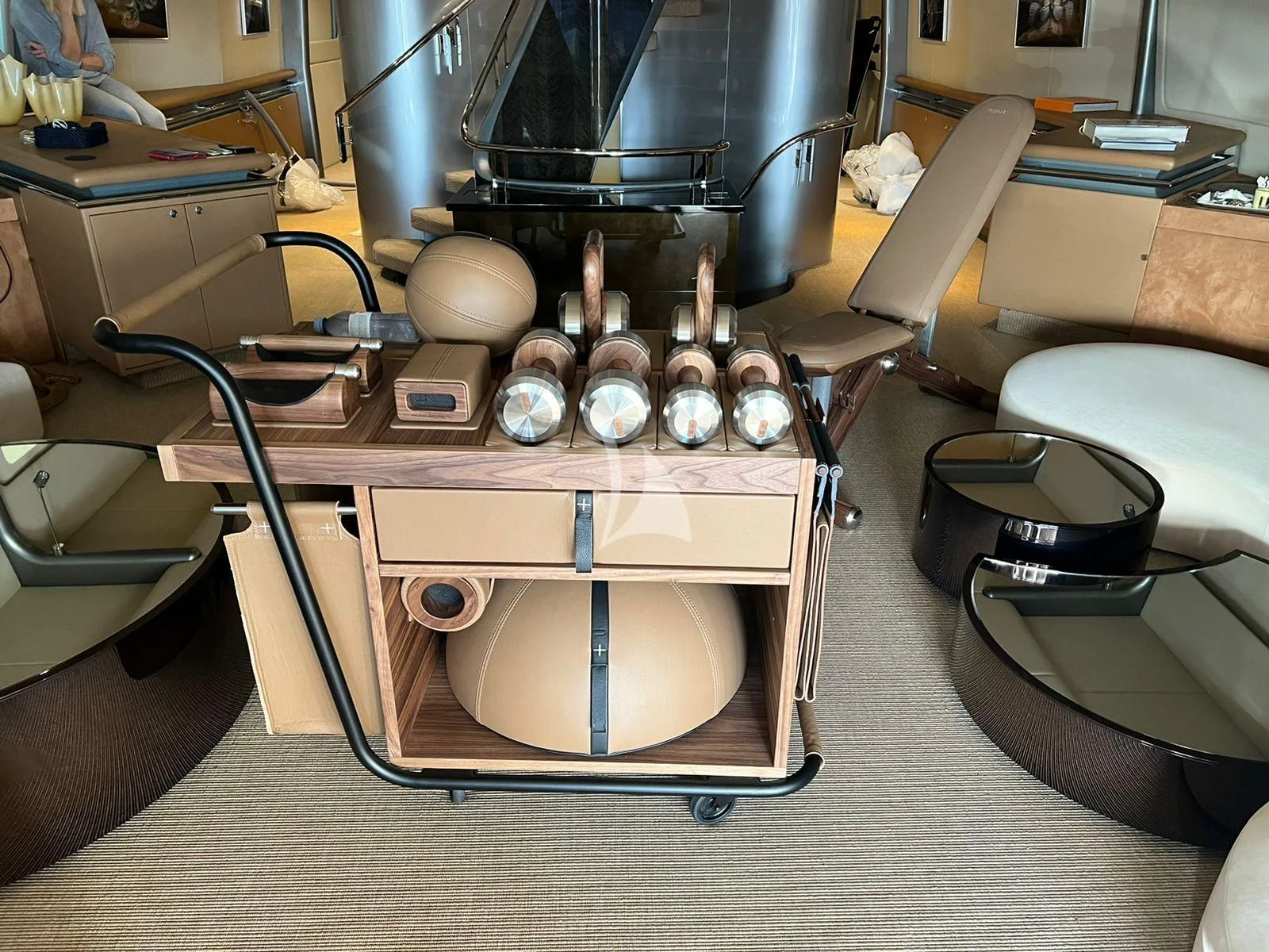 a machine with a large metal cylinder aboard PANDION Yacht for Charter