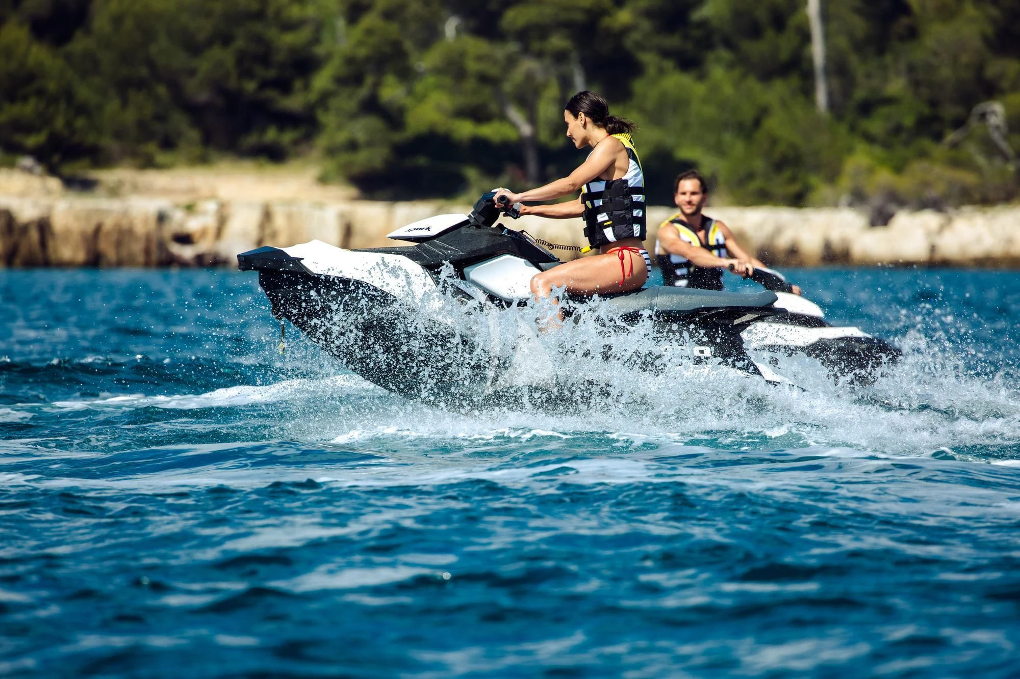 a group of people riding a jet ski aboard PANDION Yacht for Charter