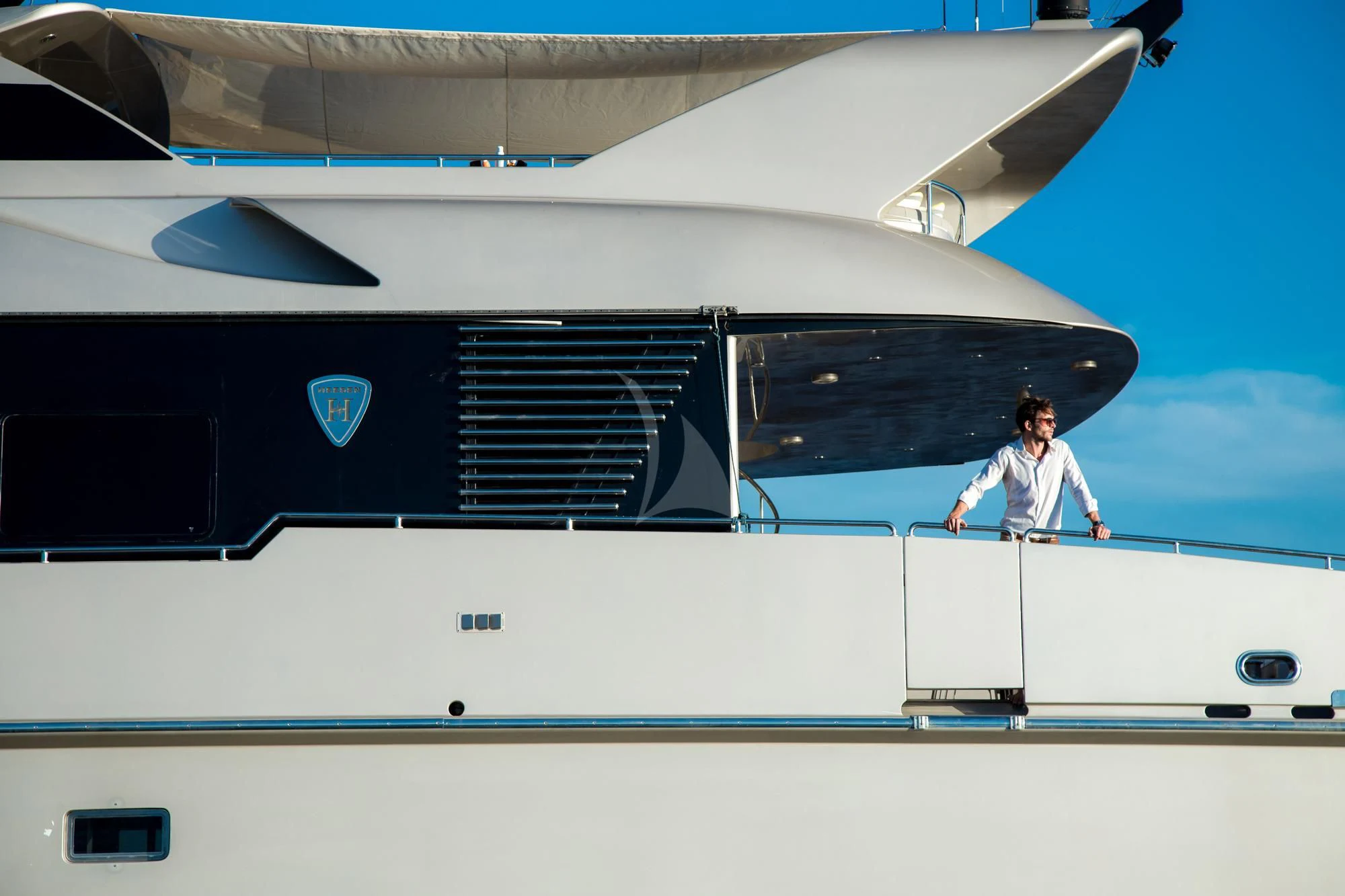 a person standing on a boat aboard PANDION Yacht for Charter