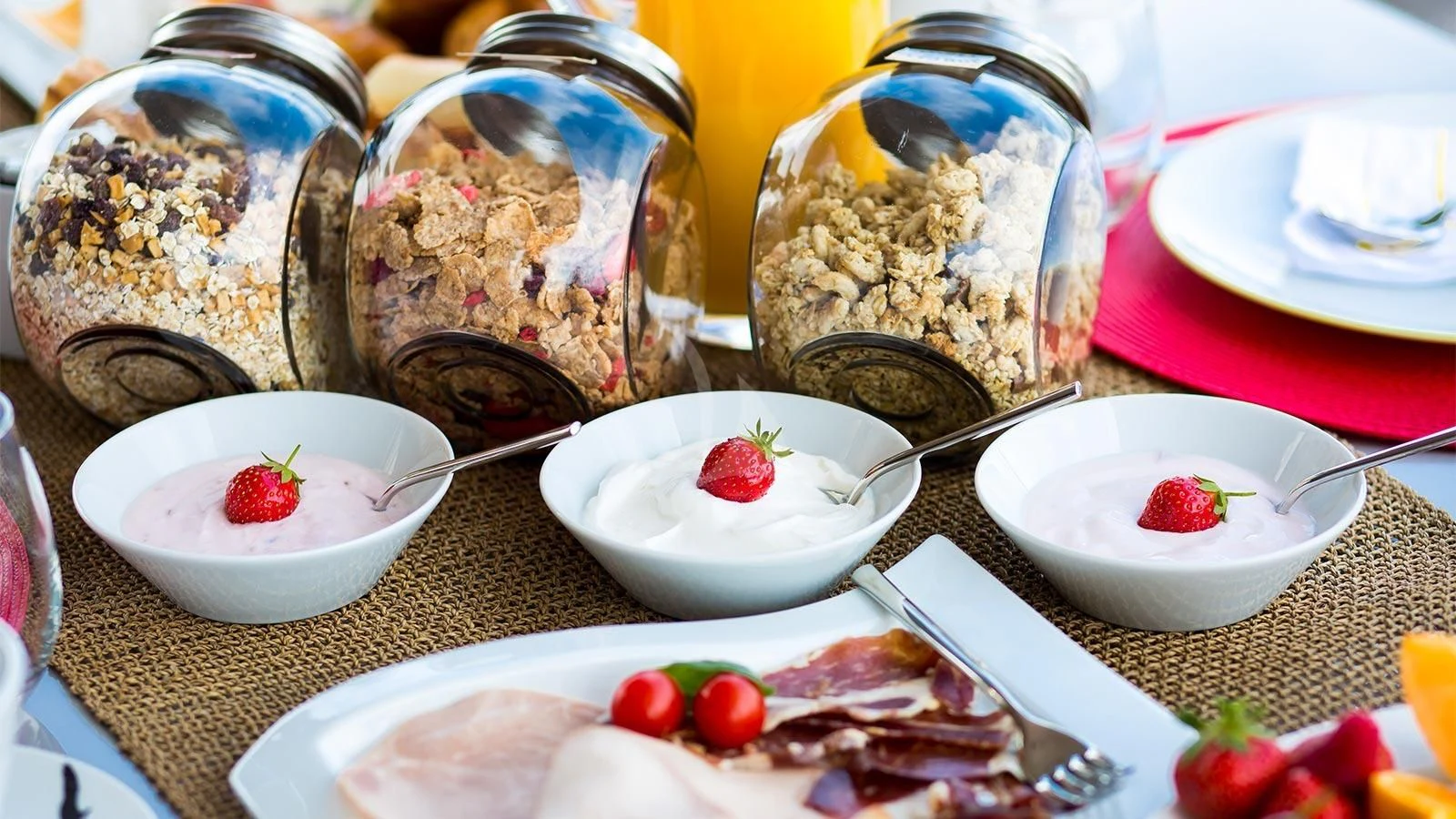 a table with food and bowls aboard PANDION Yacht for Charter