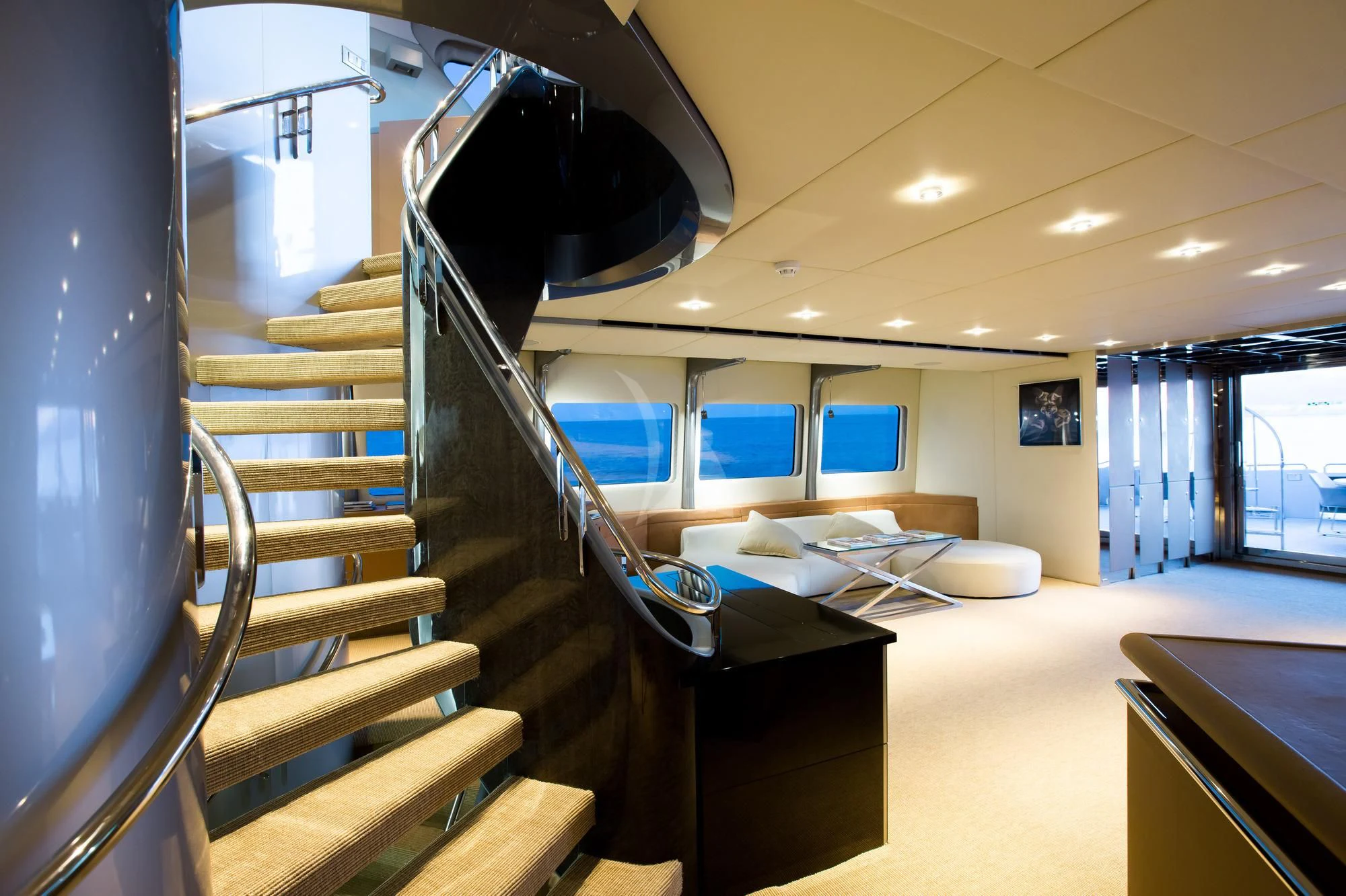 a staircase in a building aboard PANDION Yacht for Charter