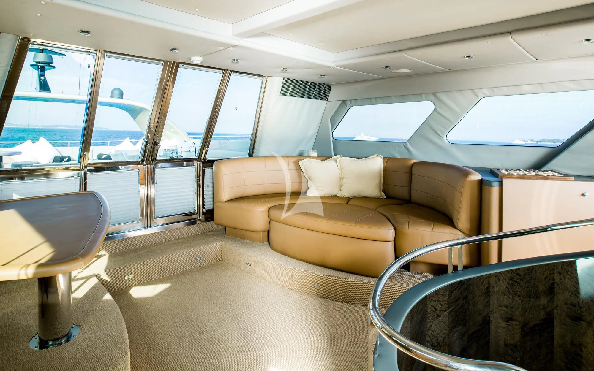 a room with a couch and a table aboard PANDION Yacht for Charter