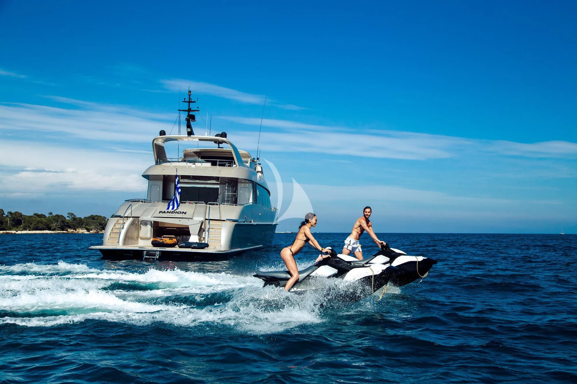 a couple of people on a boat aboard PANDION Yacht for Charter