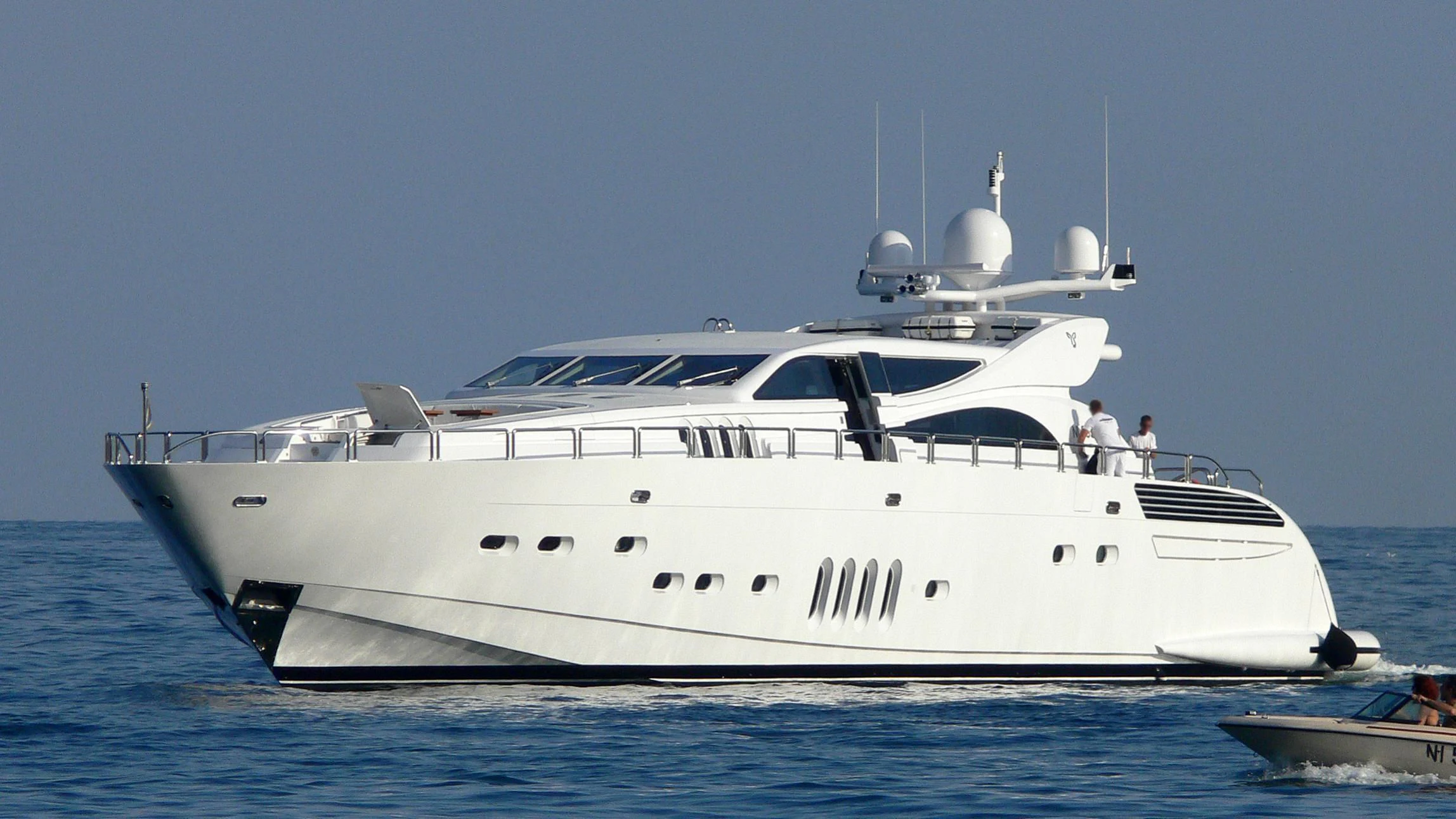 a white yacht on the water aboard YOLO Yacht for Sale