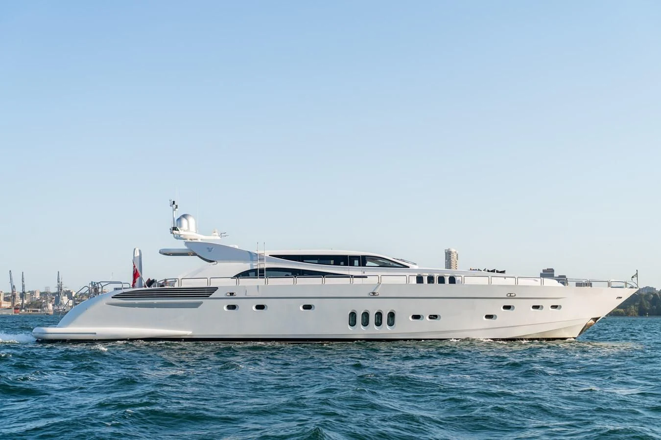 a white yacht in the water aboard YOLO Yacht for Sale