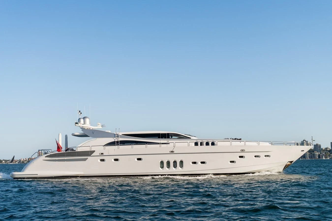 a white yacht in the water aboard YOLO Yacht for Sale