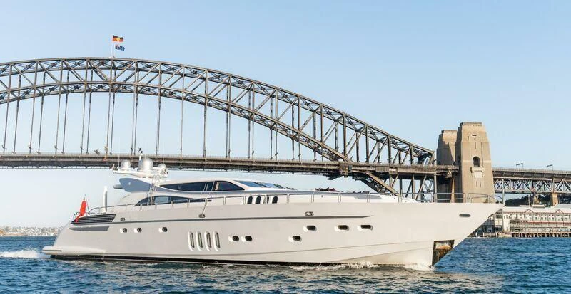 a white yacht in the water aboard YOLO Yacht for Sale