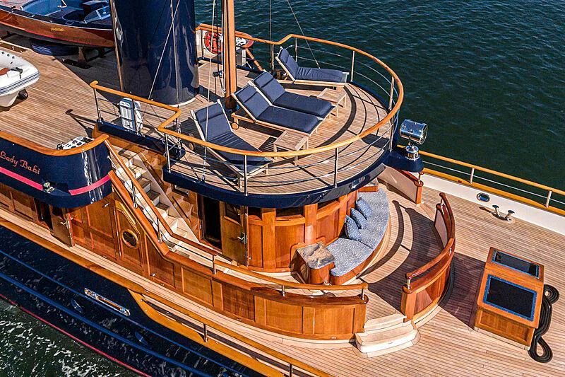 a large ship on a body of water aboard LADY BAHI Yacht for Sale