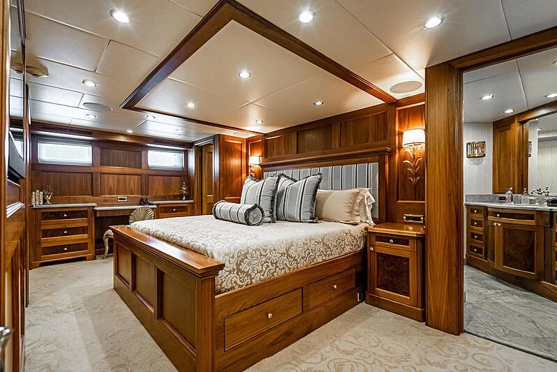 a large bedroom with a large bed aboard LADY BAHI Yacht for Sale