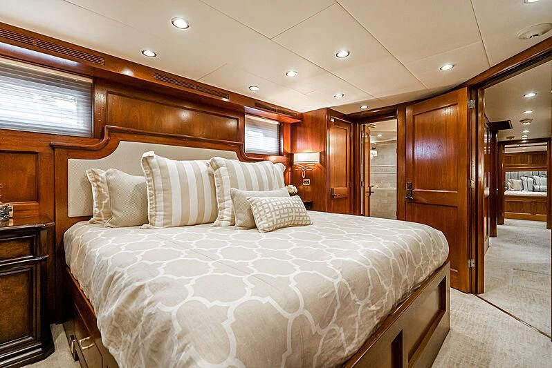 a large bed in a room aboard LADY BAHI Yacht for Sale