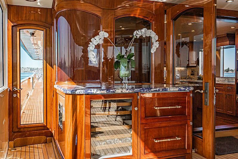 a room with a cabinet and a mirror aboard LADY BAHI Yacht for Sale